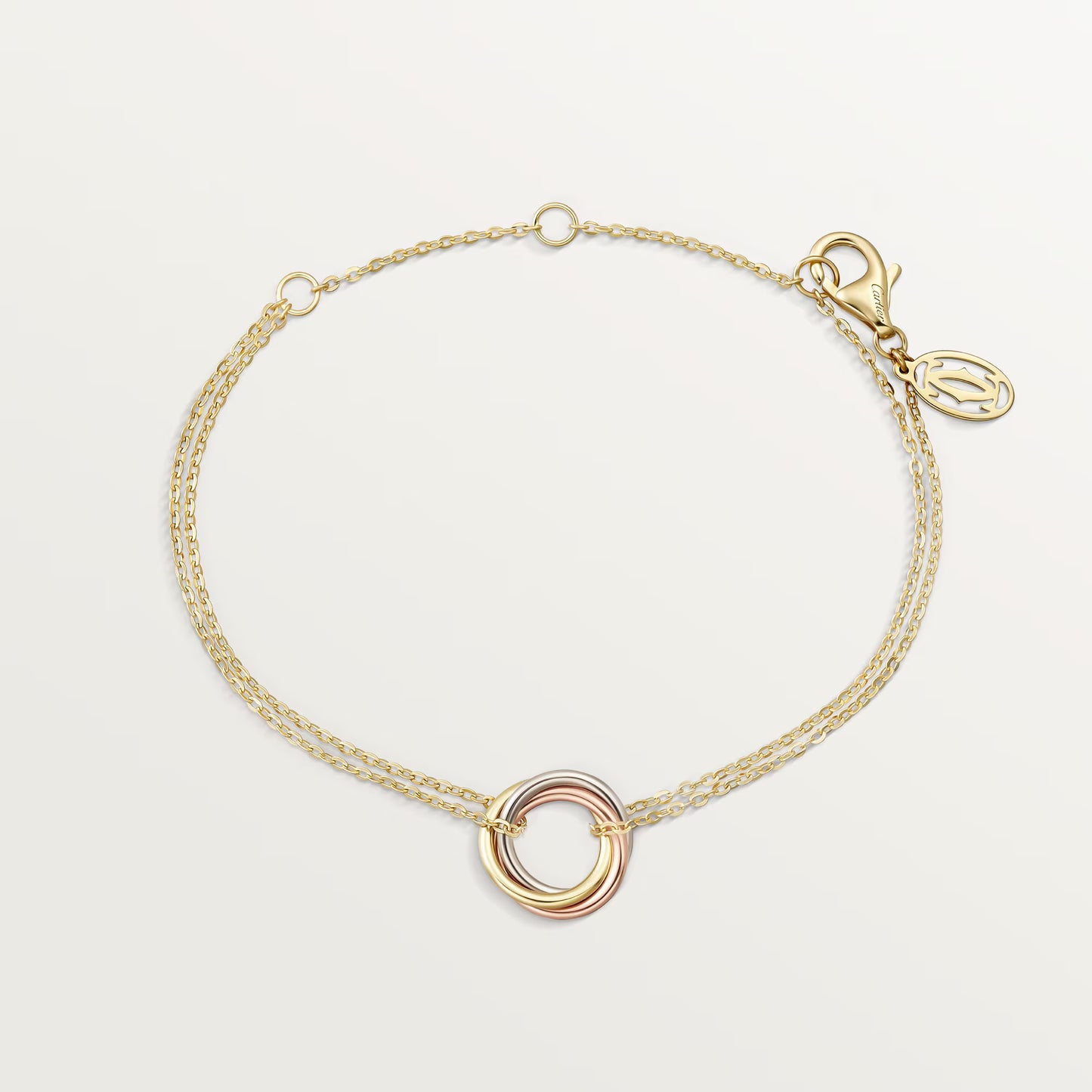 Cartier,Trinity bracelet, on chain,Yellow gold chain with mixed trinity ring