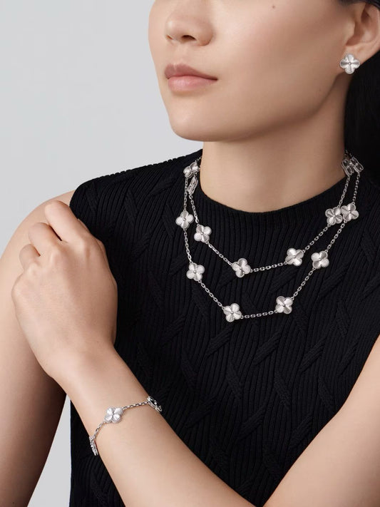 Van Cleef Vintage Alhambra earrings White gold