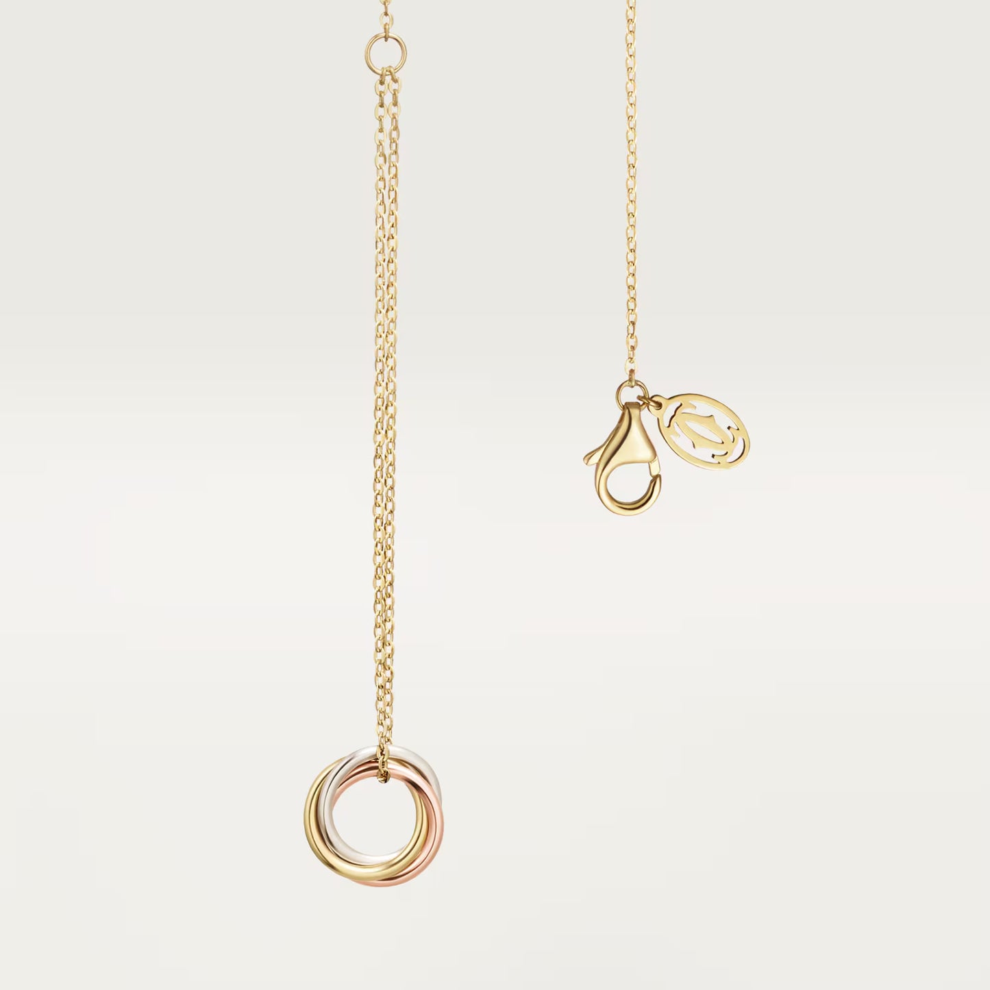Cartier,Trinity bracelet, on chain,Yellow gold chain with mixed trinity ring